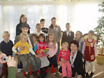 Mokiniai, mokytoja ir Mr. Arkadas